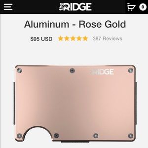 the Ridge Aluminum-Rose Gold wallet with cash strap